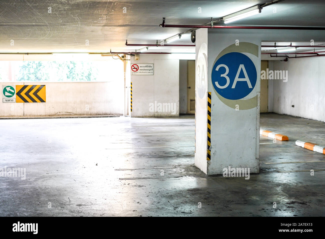 Parking lot inside the building. Text on left side means "parking