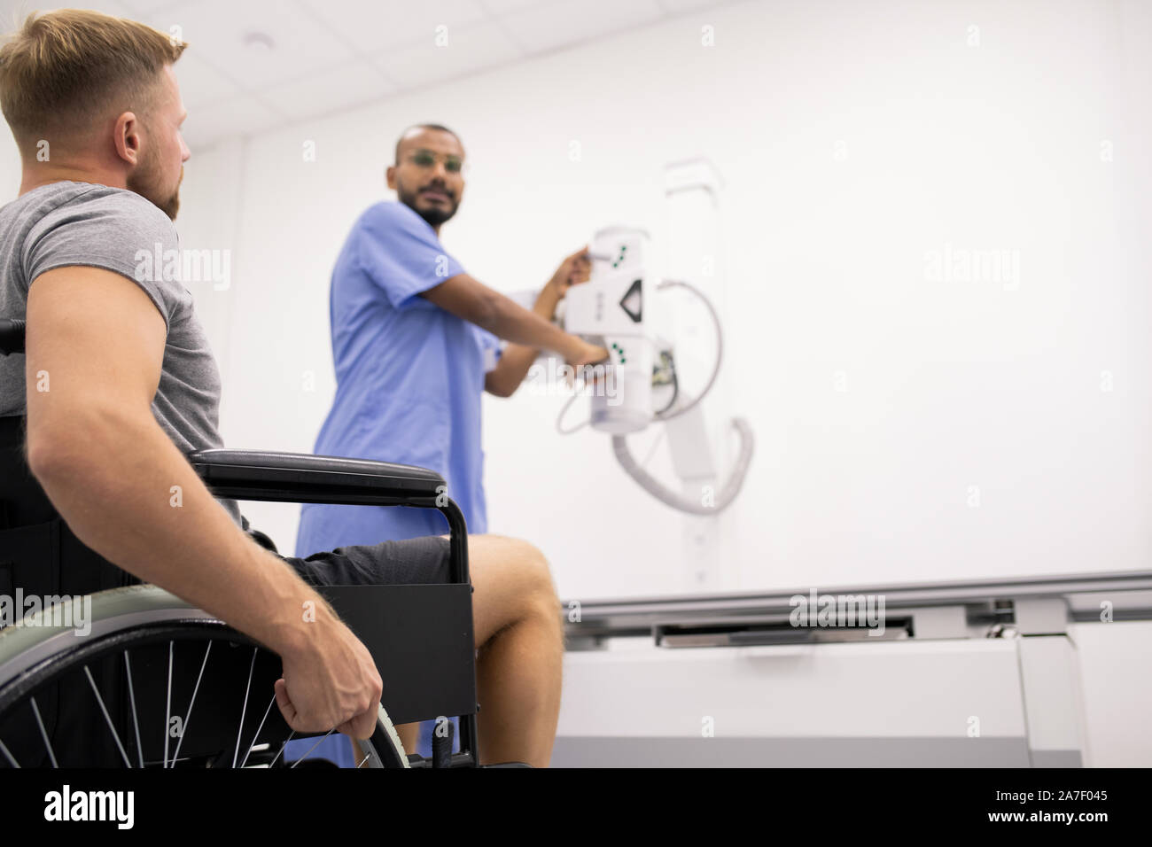 Man broken leg wheelchair hires stock photography and images Alamy