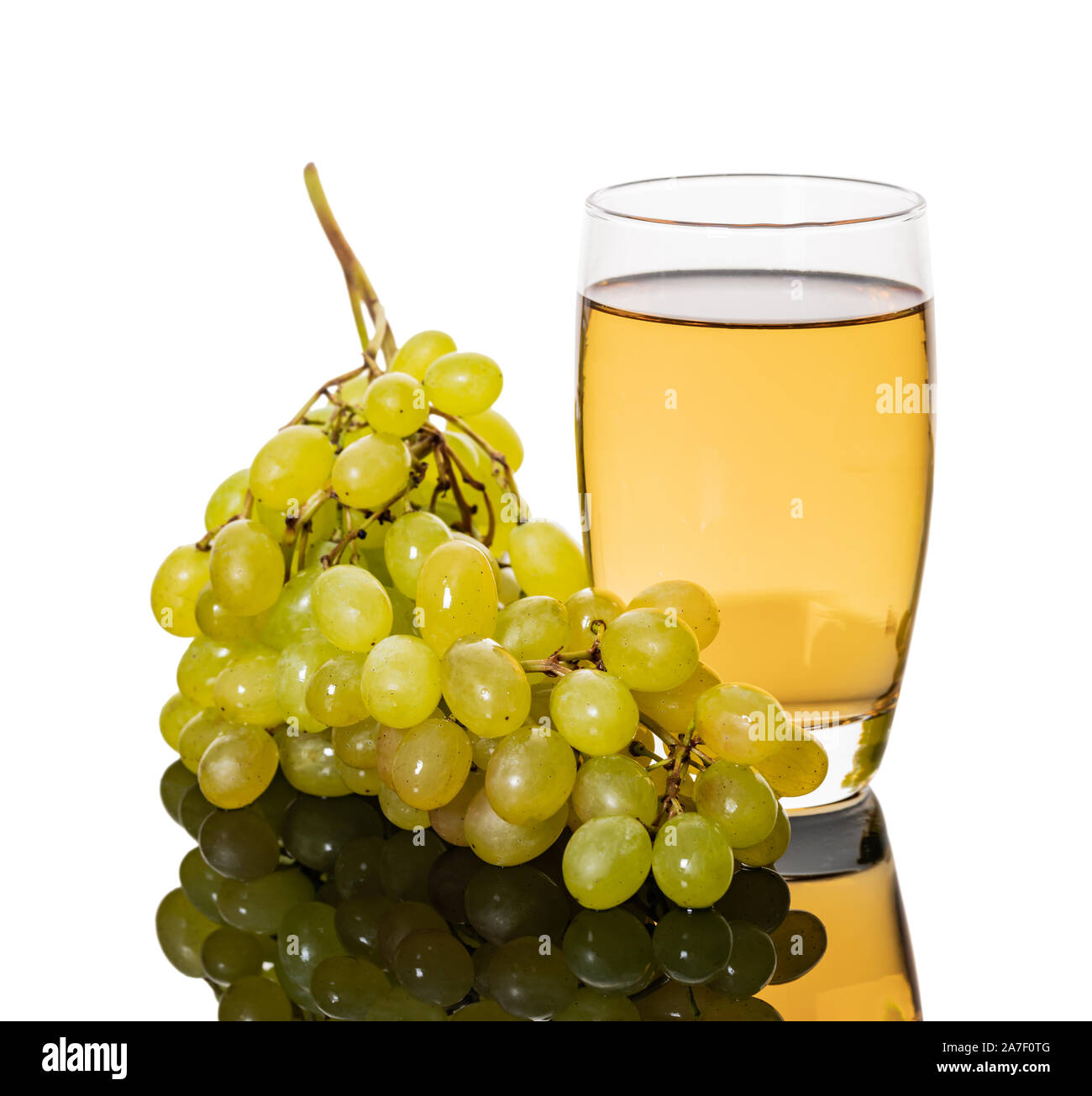 glass of grape juice with bunch of ripe green grapes Stock Photo - Alamy