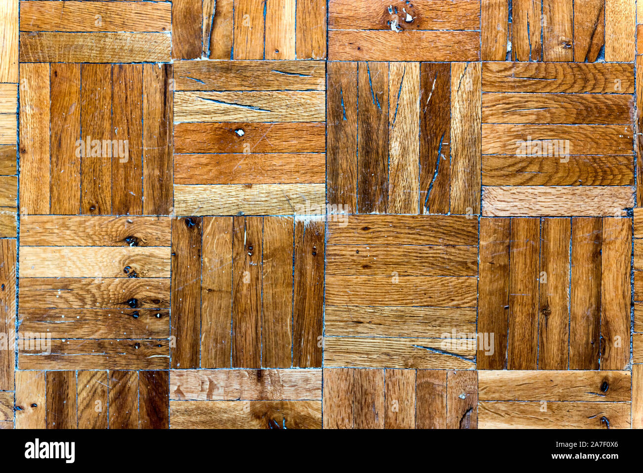 Fragment of old wooden parquet floor Stock Photo