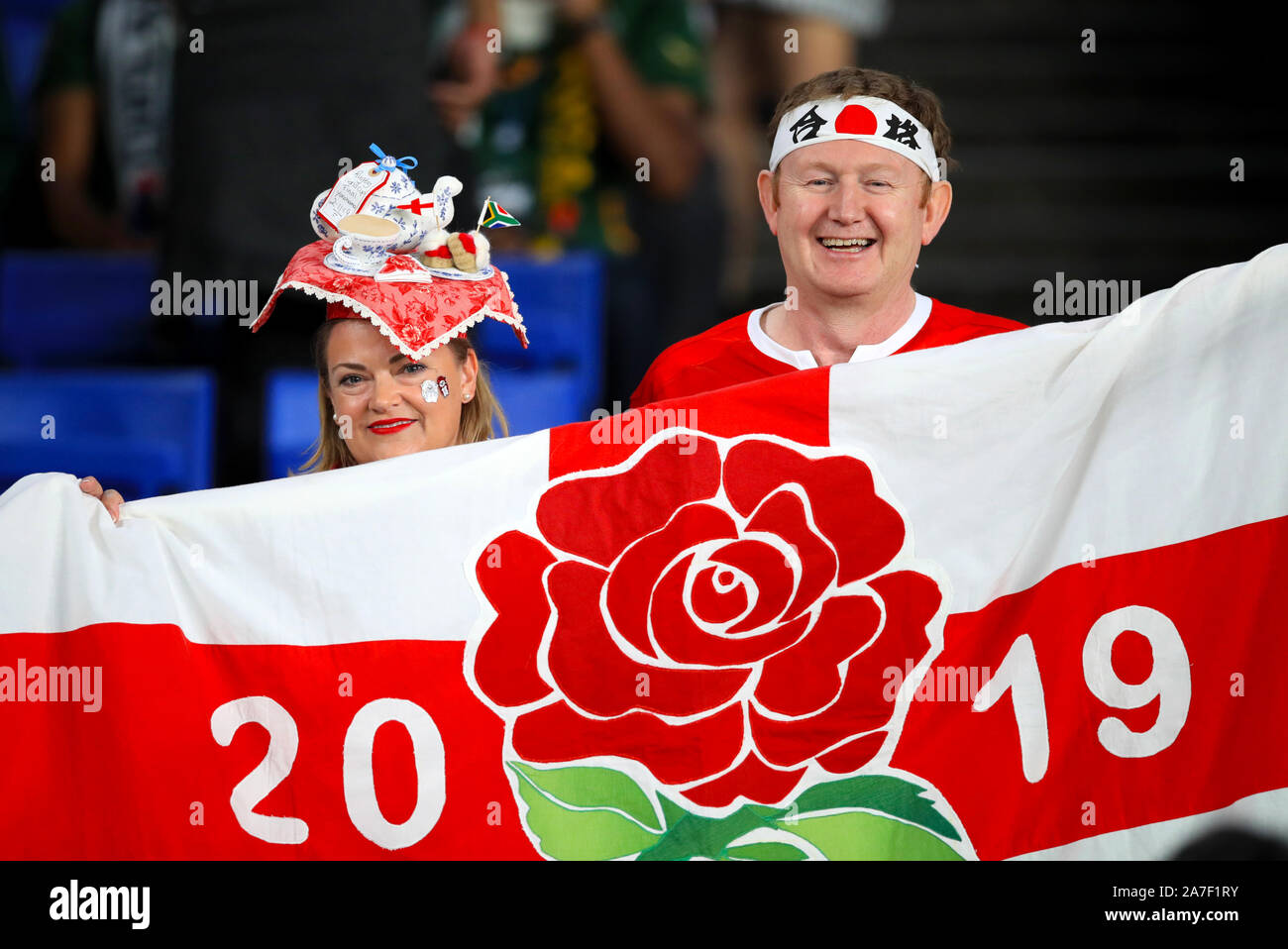 England fans show their support in the stands ahead of the 2019 Rugby World Cup final match at Yokohama Stadium. Stock Photo