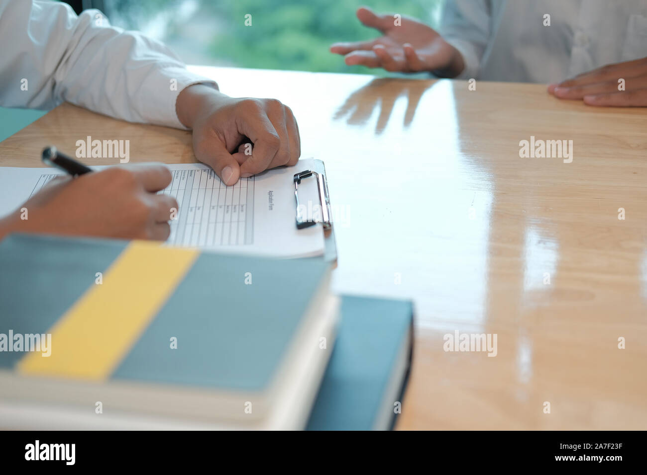 human resource manager interviewing candidate for job vacancy. applicant explaining profile for career recruitment Stock Photo