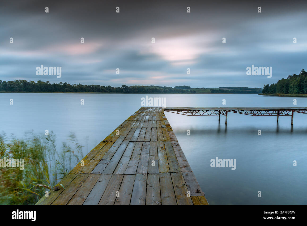 Ilawa Lake District. Platform at Orkusz Lake during Sunrise Stock Photo ...