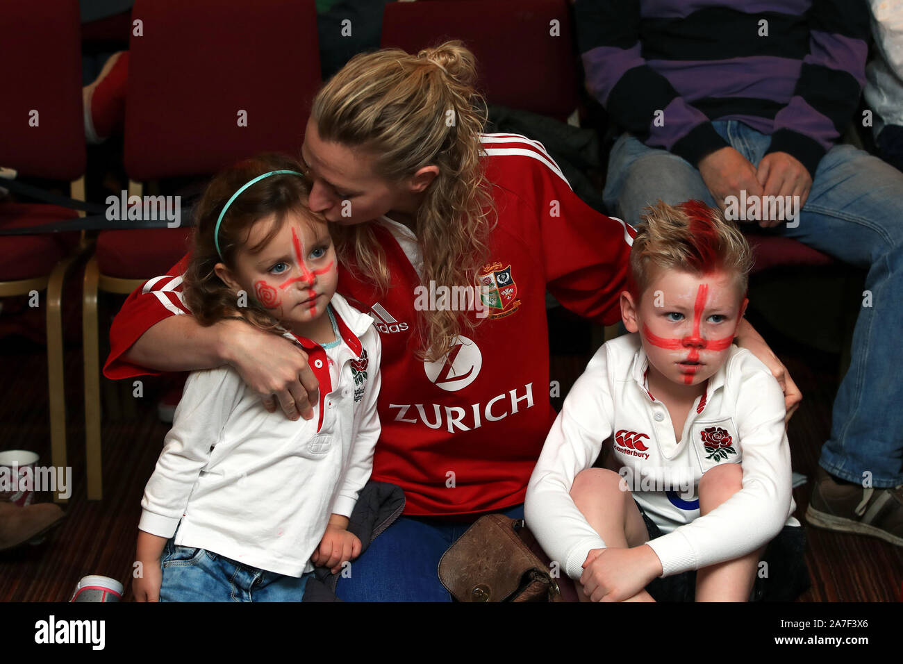 Child Parent Rugby Fans Young England fans watch the Rugby World Cup final screening at Crewe ...
