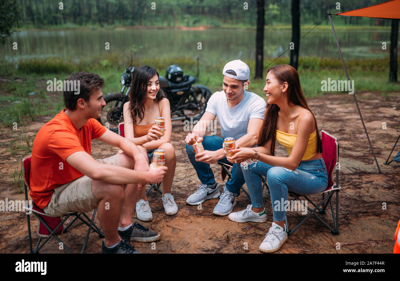 Happy Time with Friends making a Picnic Party and Barbeque on the weekend Stock Photo