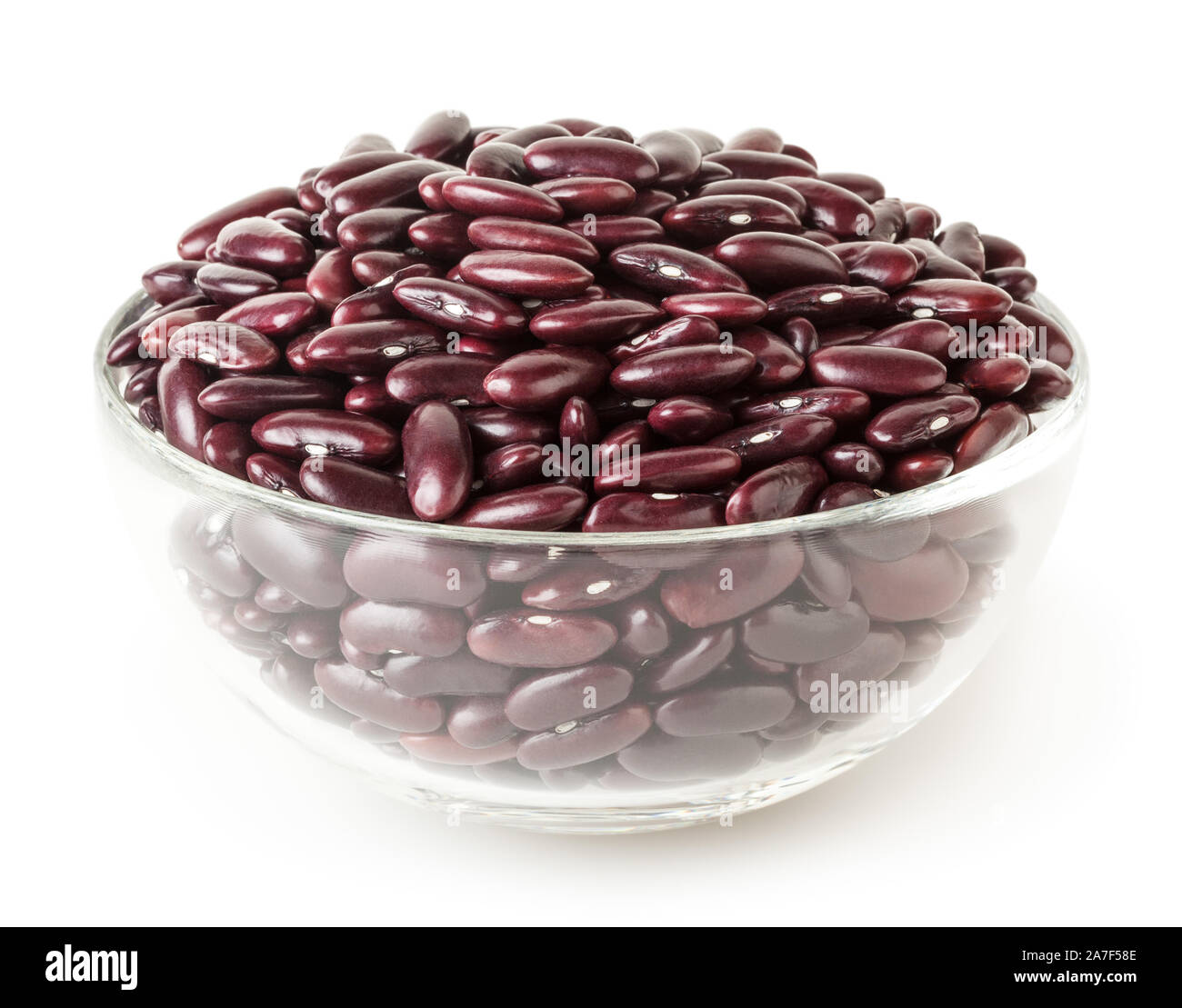 Uncooked red kidney beans in glass bowl isolated on white background