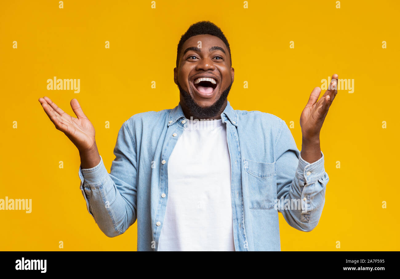 Man raising hands open mouth hi-res stock photography and images - Alamy