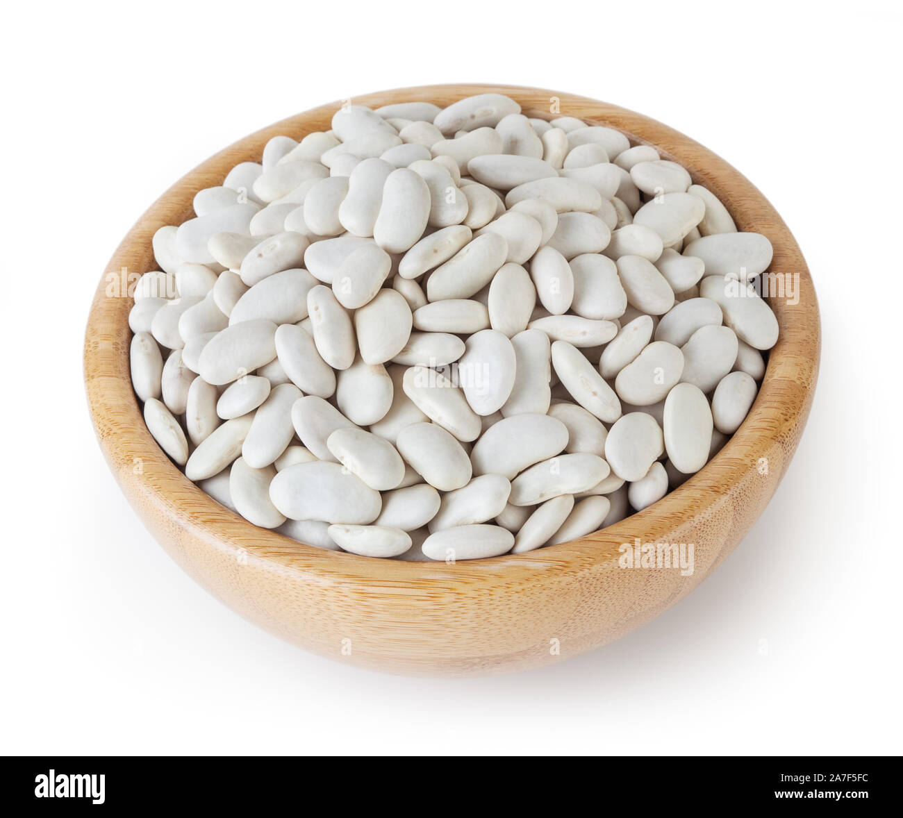 Uncooked lima beans in wooden bowl isolated on white background with