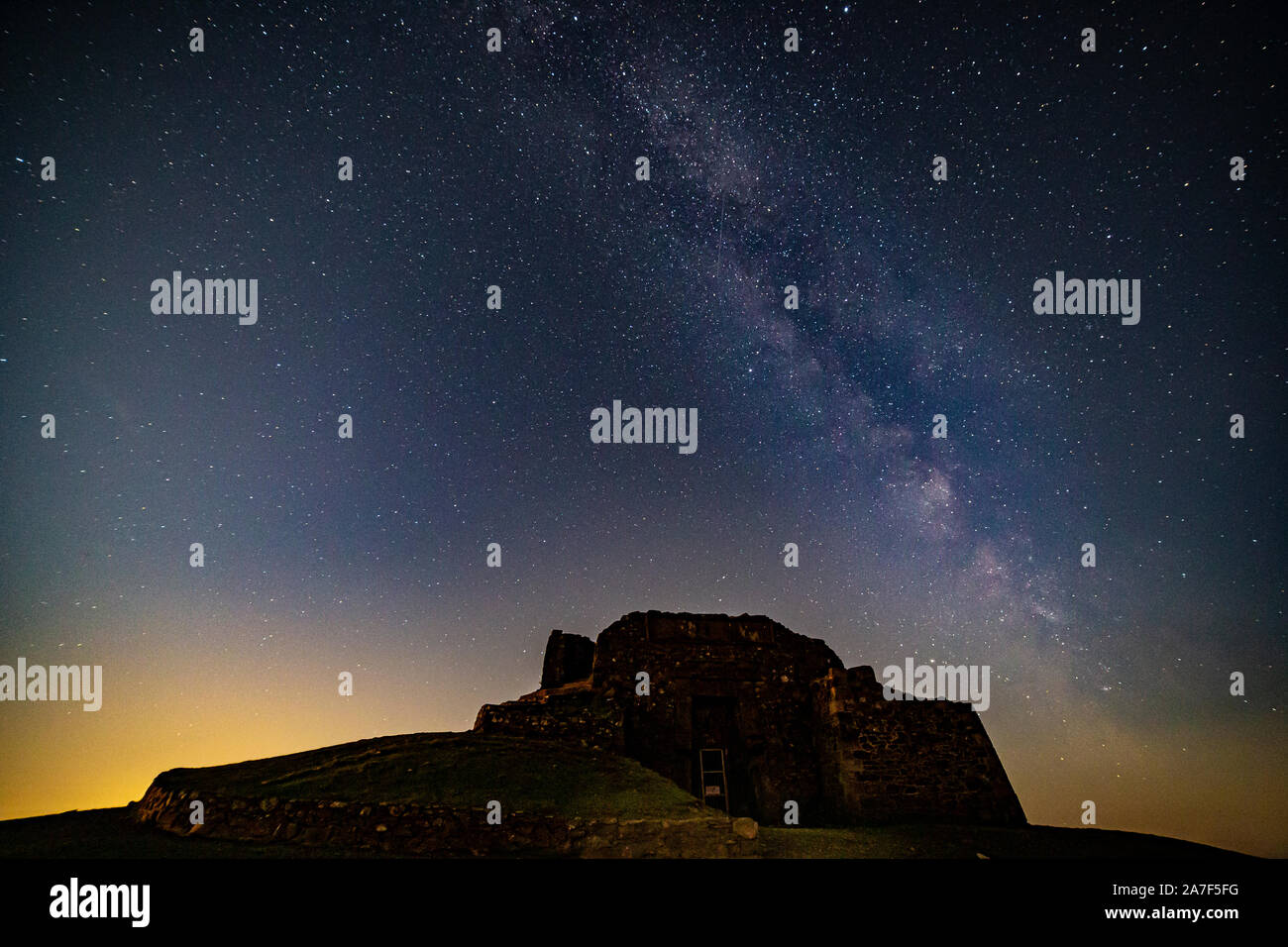 Milky way over the Jubilee tower, Moel Famau, Clwydian Range, North Wales Stock Photo