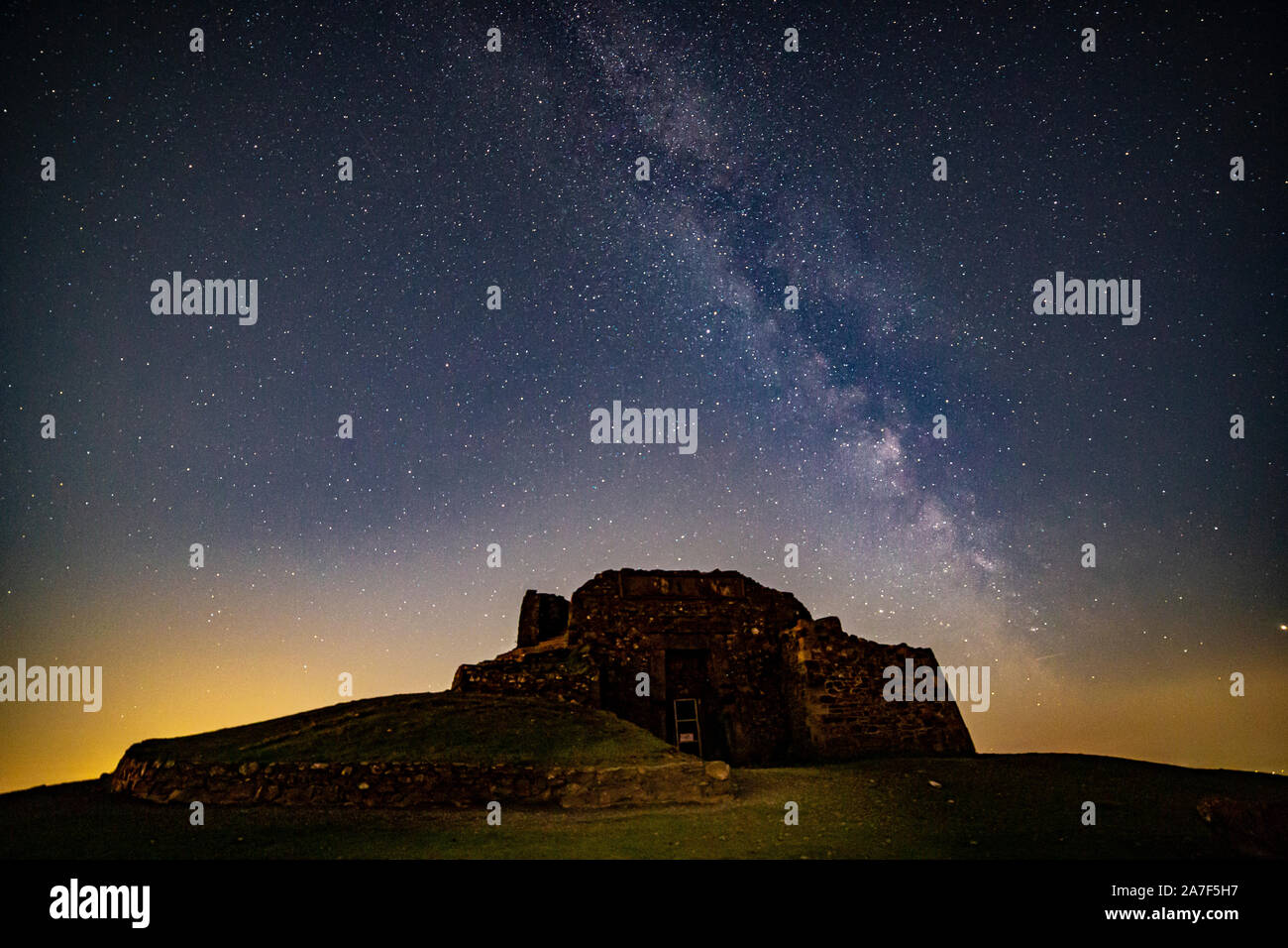 Milky way over the Jubilee tower, Moel Famau, Clwydian Range, North Wales Stock Photo