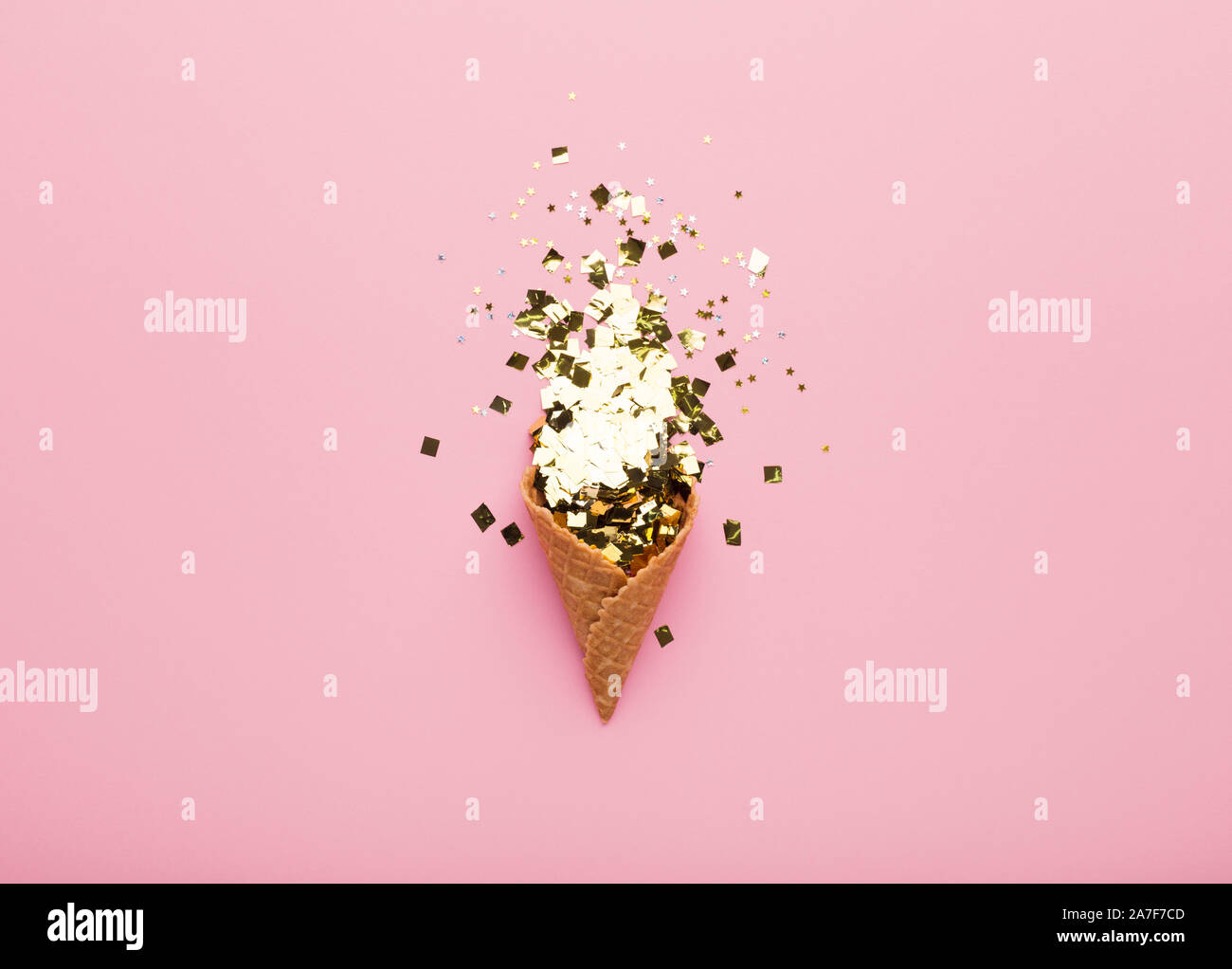 Conceptual greeting card with waffle horn and confetti inside Stock Photo