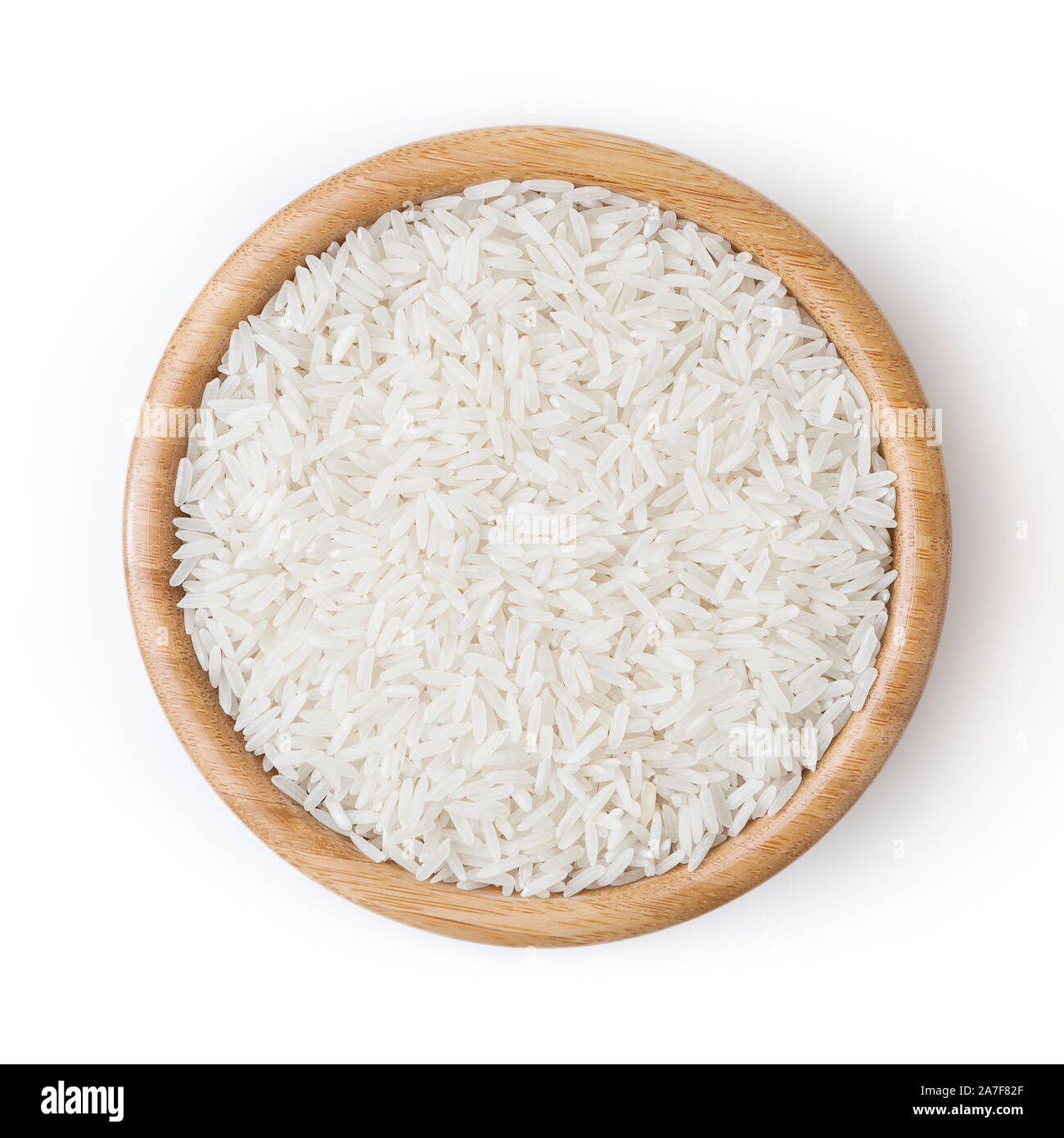 White rice in wooden bowl isolated on white background with clipping path Stock Photo