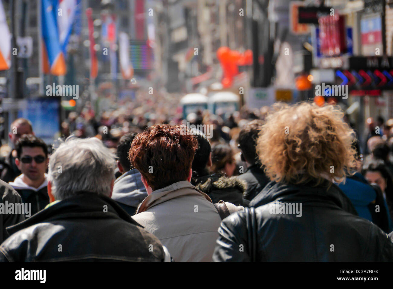 Amsterdam, Netherlands. Circa spring 2013. Large crowd on people walking on street in Amsterdam. Stock Photo
