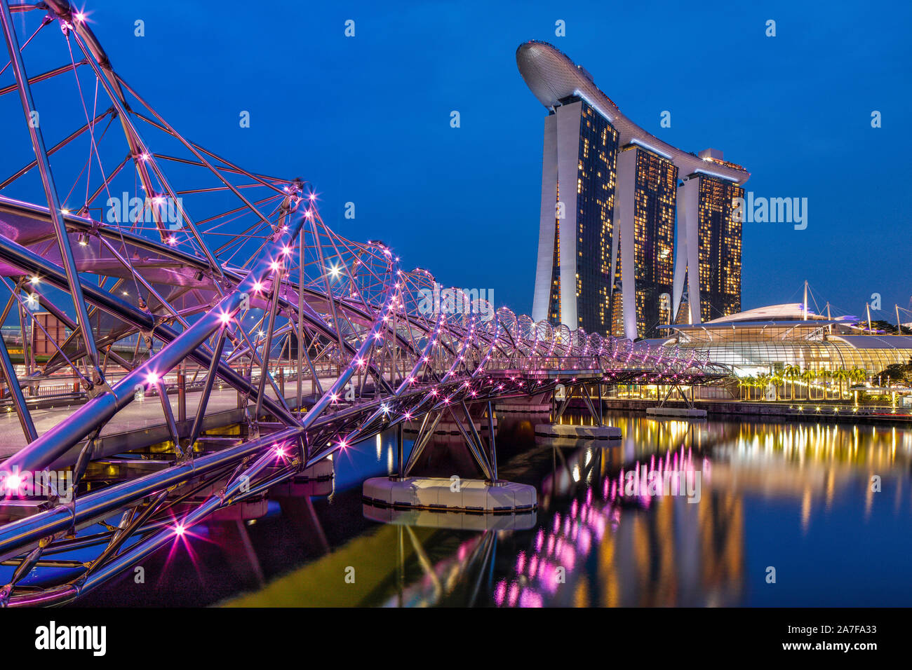 The Helix Bridge with the Marina Bay Sands in the background, Marina Bay, Singapore. Stock Photo