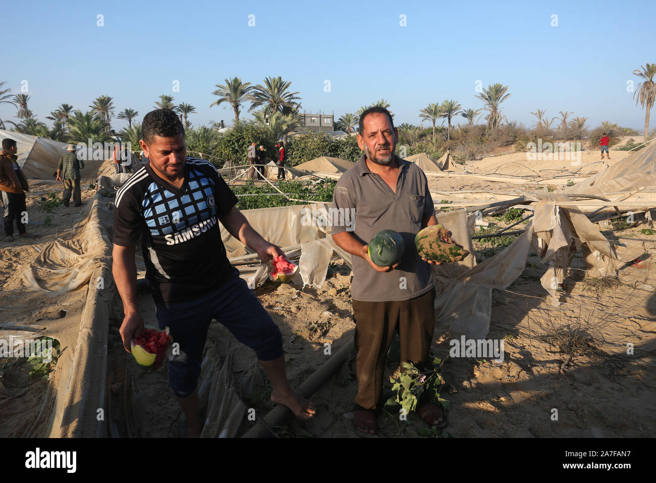 Palestinians inspect positions of Qassam Brigades that was hit by Israeli fighter jets, in Gaza Strip on Nov 2, 2019. Photo by Abed Rahim Khatib/Alamy Stock Photo