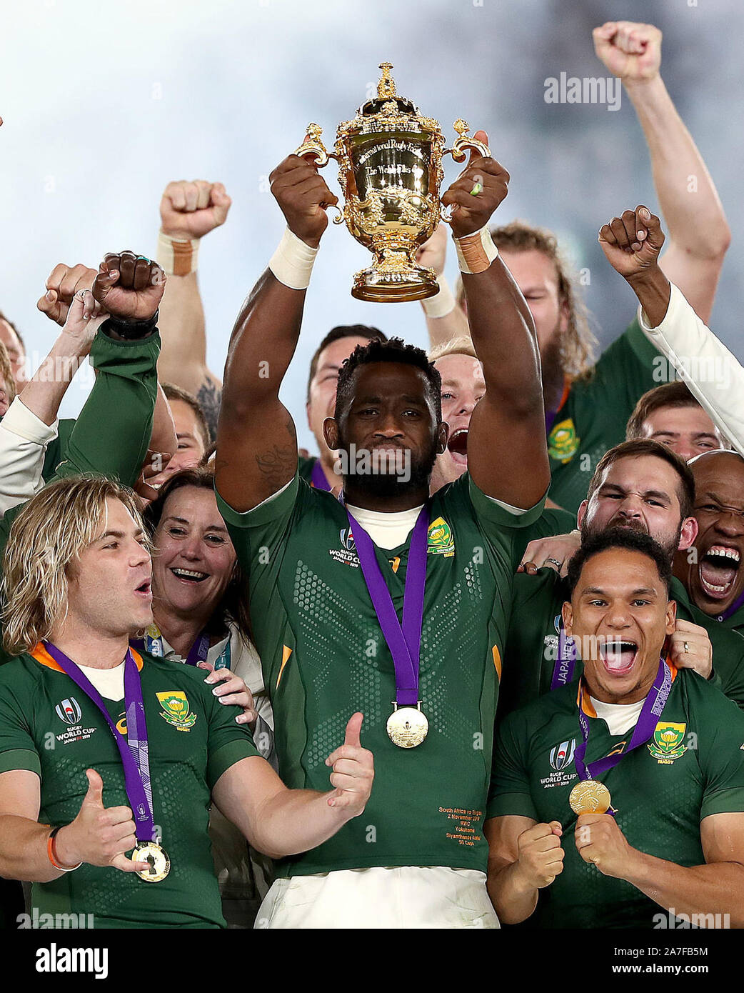 South Africa's Siya Kolisi lifts the Webb Ellis cup after South After win the 2019 Rugby World Cup final match at Yokohama Stadium. Stock Photo