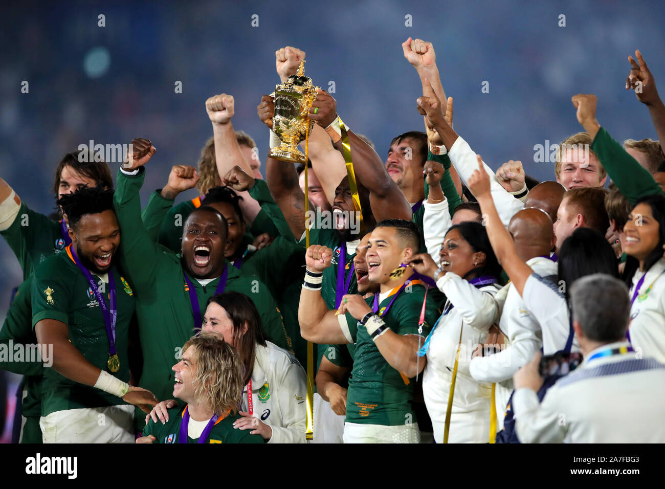 South Africa's Siya Kolisi lifts the Webb Ellis cup after South Africa win the 2019 Rugby World Cup final match at Yokohama Stadium. Stock Photo