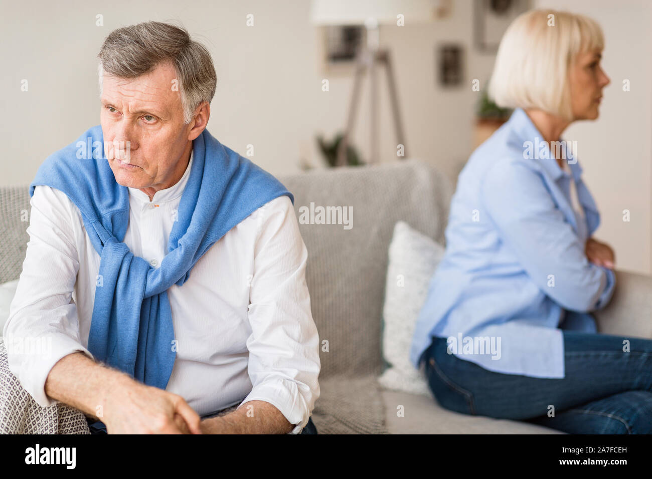 Young african-american couple quarreling at home, offended at each other . Family relationship difficulties concept Stock Photo