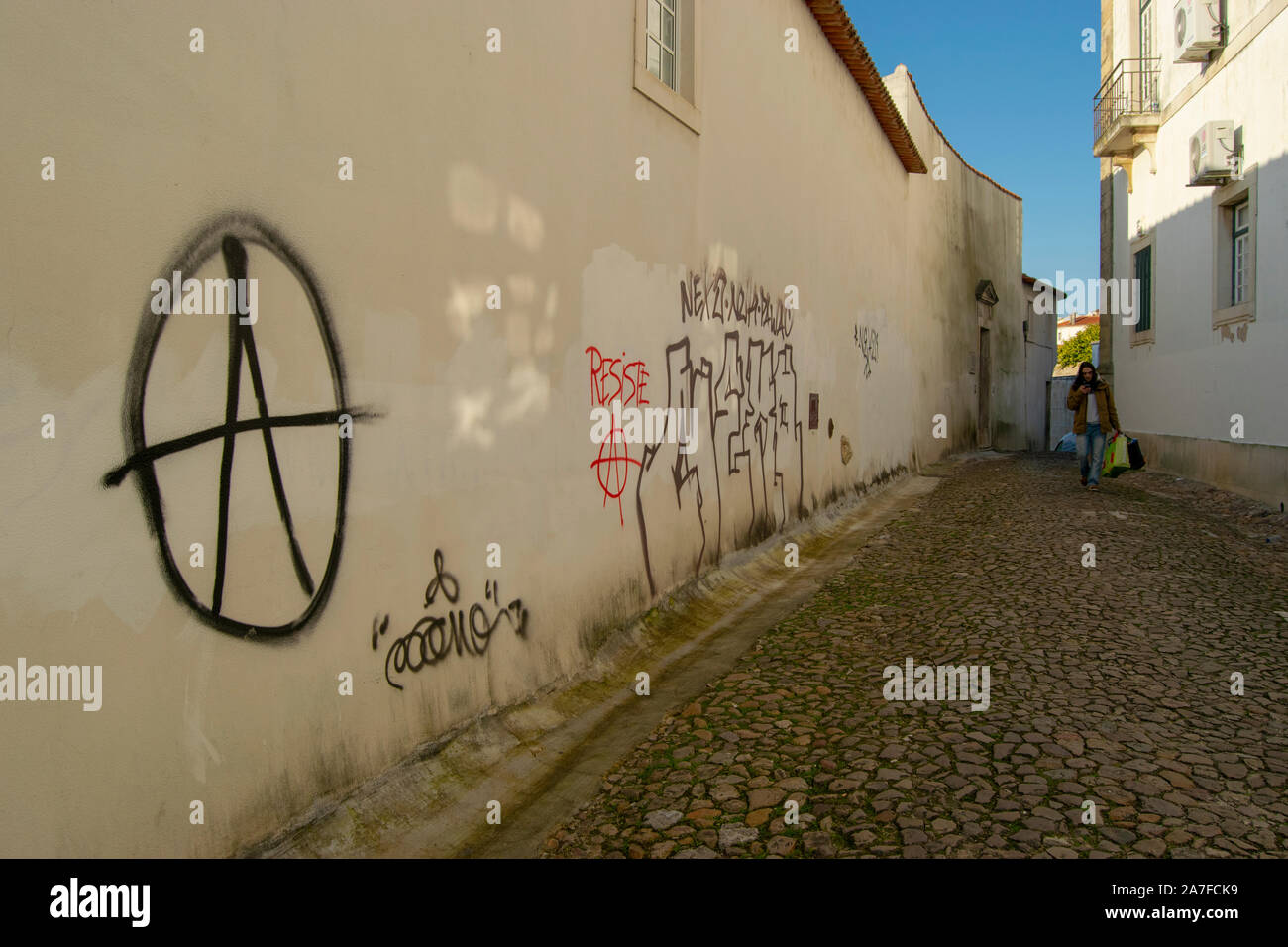 Grafitti on a wall in the old town of Coimbra Portugal Stock Photo
