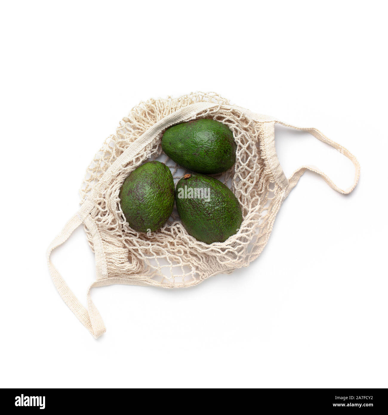 https://c8.alamy.com/comp/2A7FCY2/fresh-avocado-in-eco-bag-for-fruits-and-vegetables-2A7FCY2.jpg