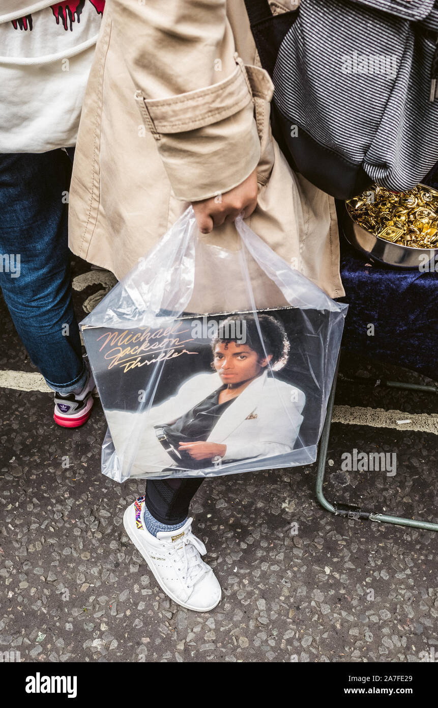A copy of Michael Jacksons Thriller album in a see through plastic bag at London's Portobello Road Market, London Stock Photo