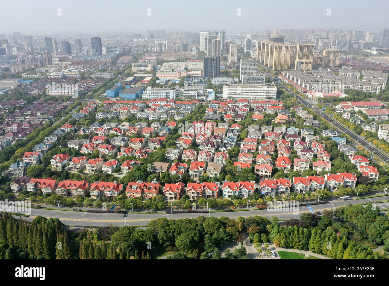 Taicang, China's Jiangsu Province. 31st Oct, 2019. Aerial photo shows a city view in Taicang, east China's Jiangsu Province, Oct. 31, 2019. Taicang has been making great efforts to improve business environment through facilitating administrative procedures for enterprises including registration, project approval and tax registration in recent years. As a result, Taicang has attracted investment of over 1,500 foreign enterprises. Credit: Li Bo/Xinhua/Alamy Live News Stock Photo