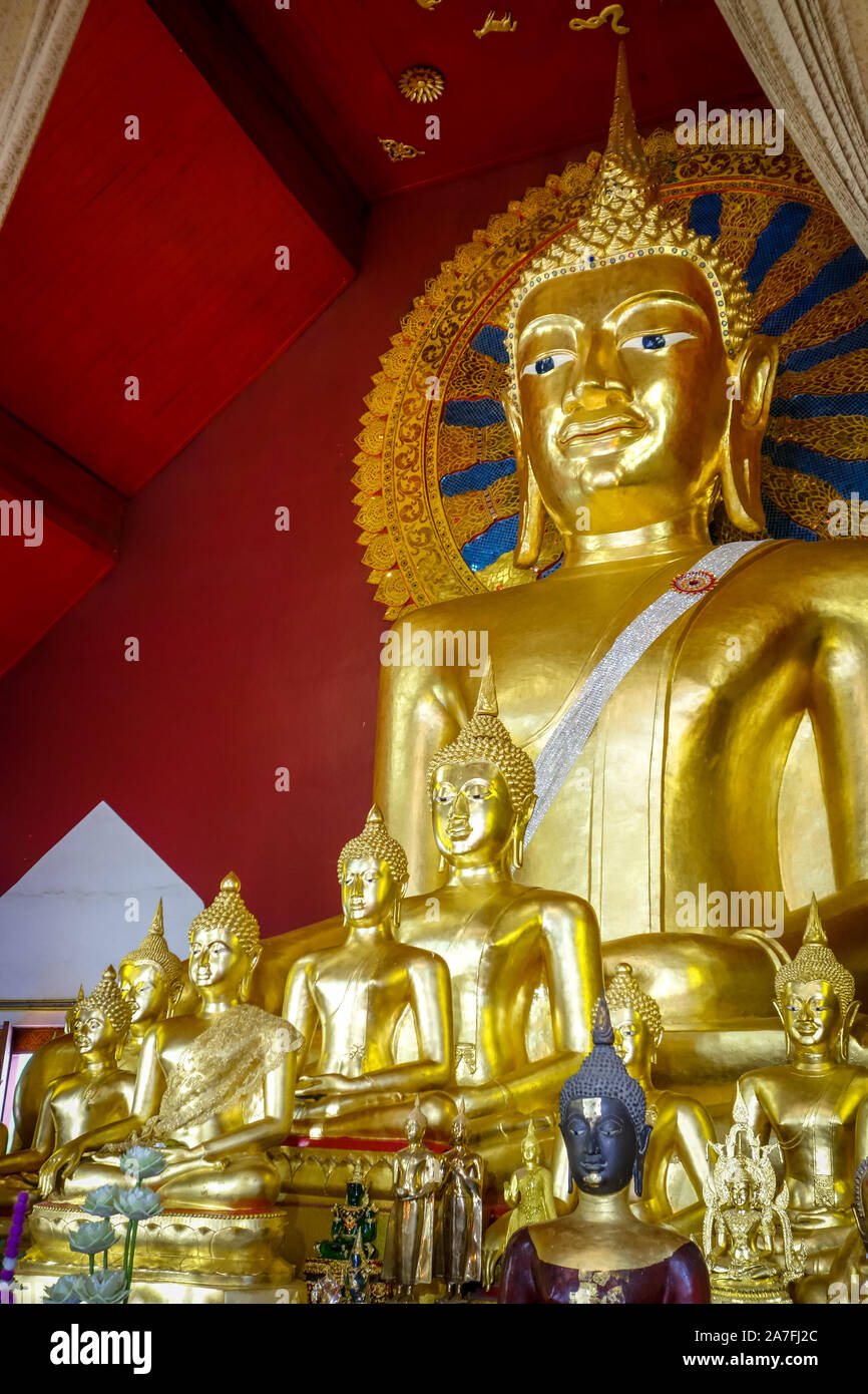 Gold buddha statue in wat phra singh temple hi-res stock photography ...