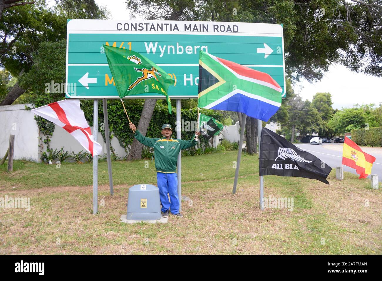 Rugby World Cup Flags Are Waved By A Street Seller In Cape Town