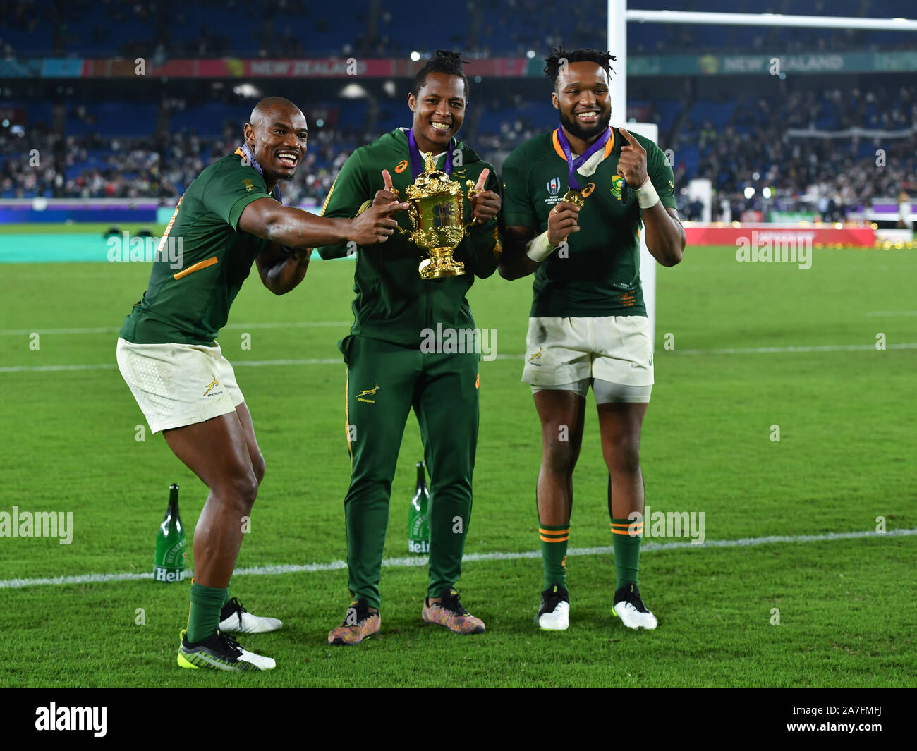 South Africa's Sbu Nkosi with Makazole Mapimpi and Lukhanyo Am after