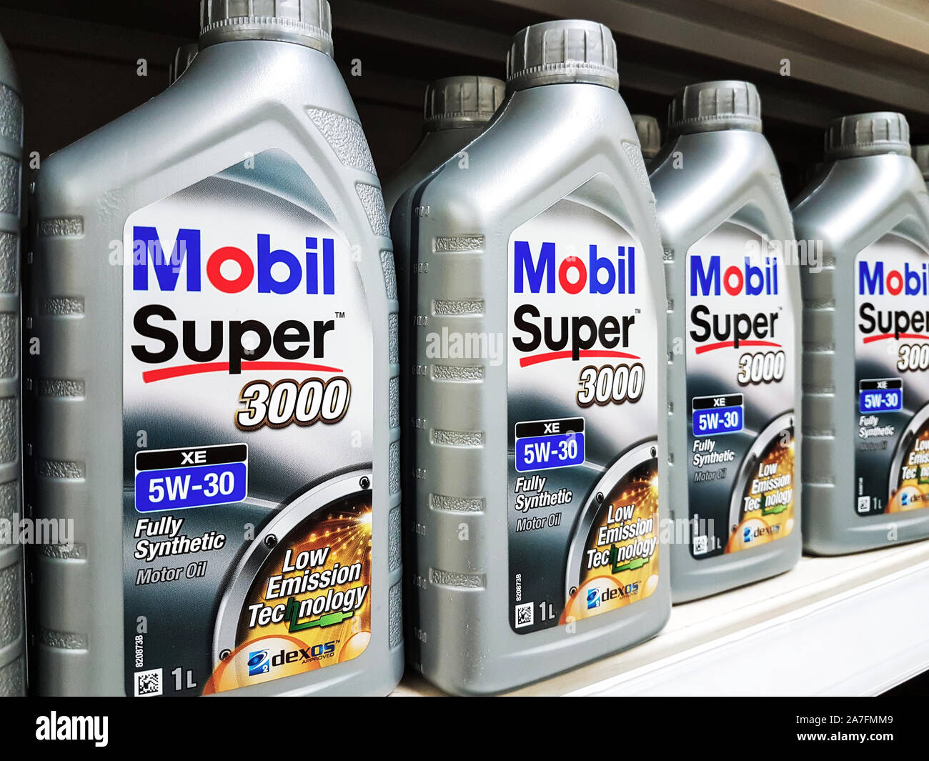 Nowy Sacz, Poland - November 03, 2018 : Mobile Super Oil product displayed at supermarket for sale. ExxonMobil is a major American oil company. Stock Photo
