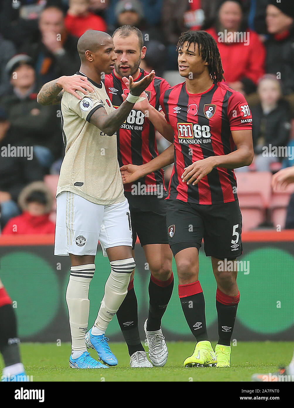 Manchester United's Ashley Young (left) talks to Bournemouth's Steve Cook  and Nathan Ake during the Premiership match at The Vitality Stadium,  Bournemouth Stock Photo - Alamy