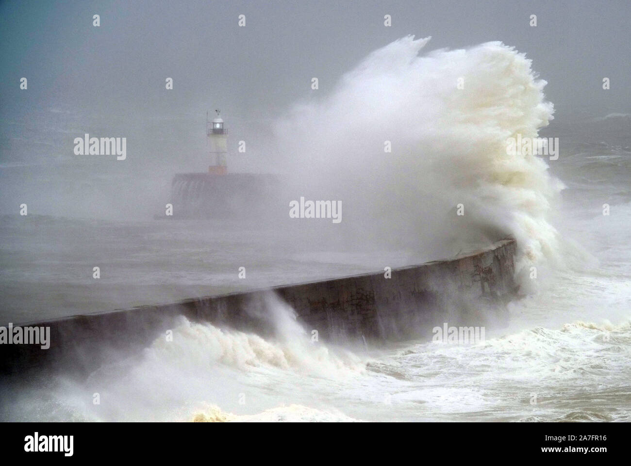 Newhaven. East Sussex, UK. 2nd Nov, 2019. Gail foce winds create huge waves that crash into the Victorian lighthouse in Newhaven. East Sussex. Credit: Peter Cripps/Alamy Live News Stock Photo