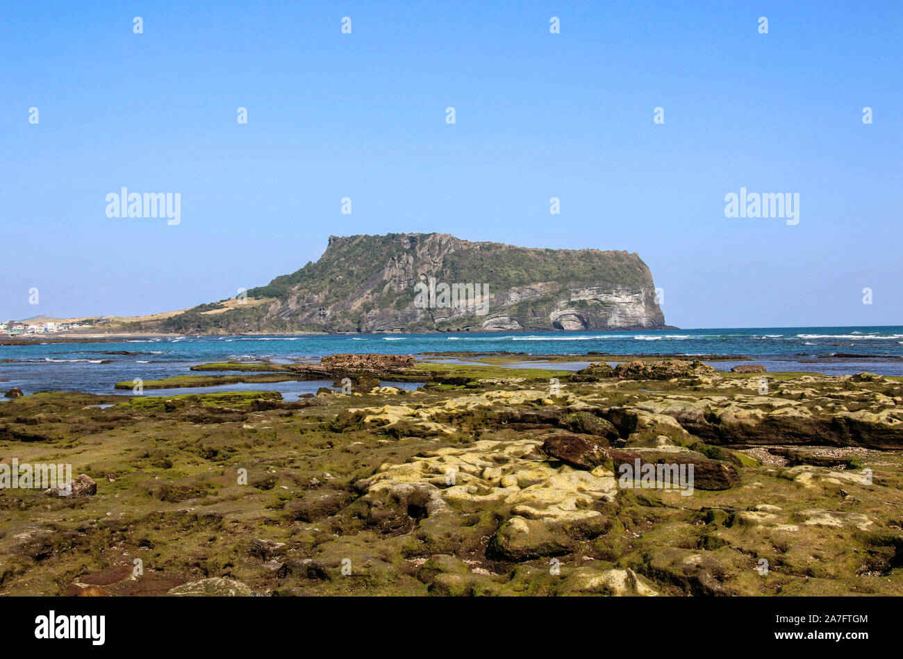 Shallows before Seongsan Ilchulbong, Jeju Island, South Korea Stock Photo