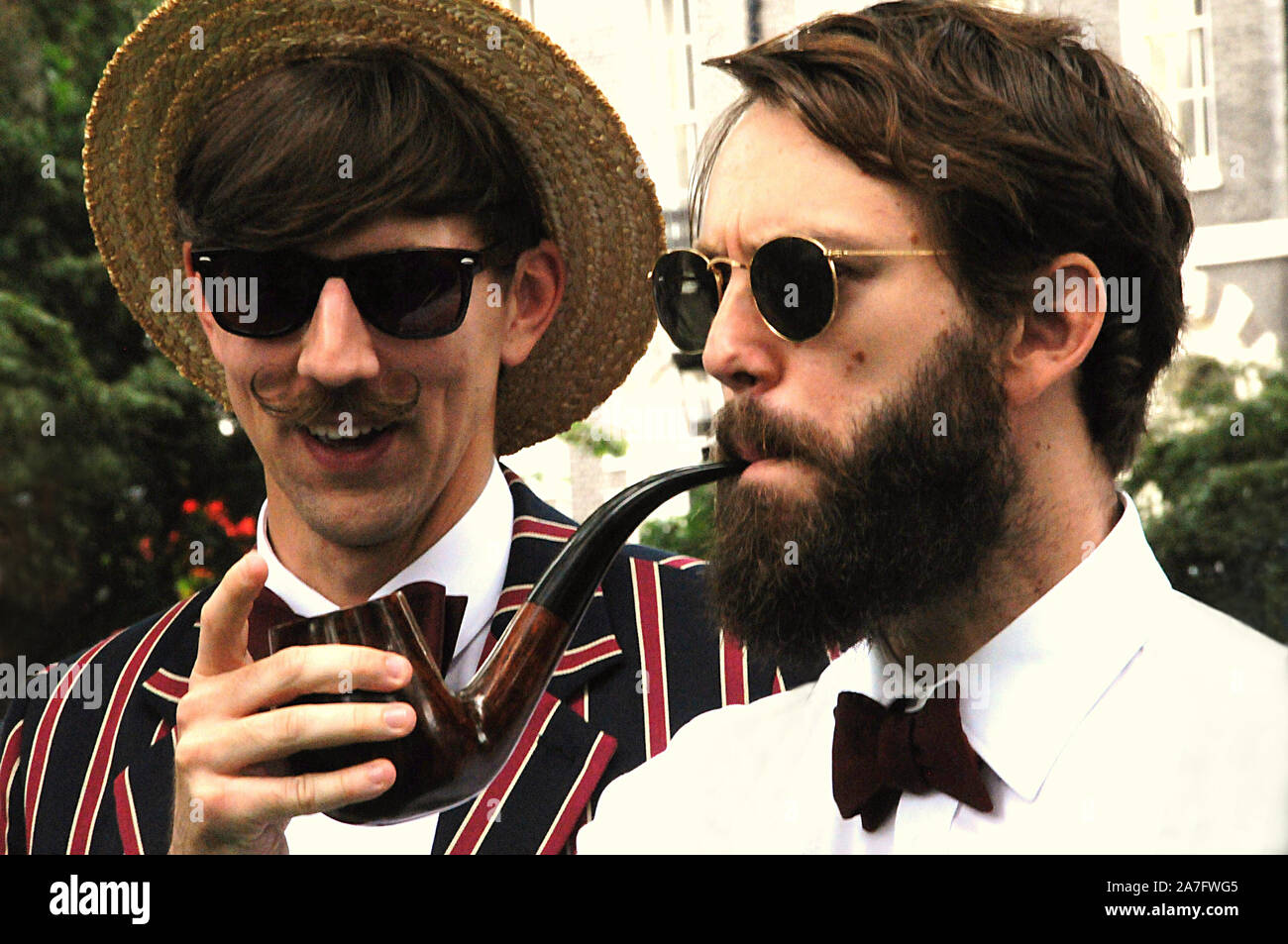 Smoking a pipe at London's annual spoof Olympics, the Chap Olympiad. Stock Photo