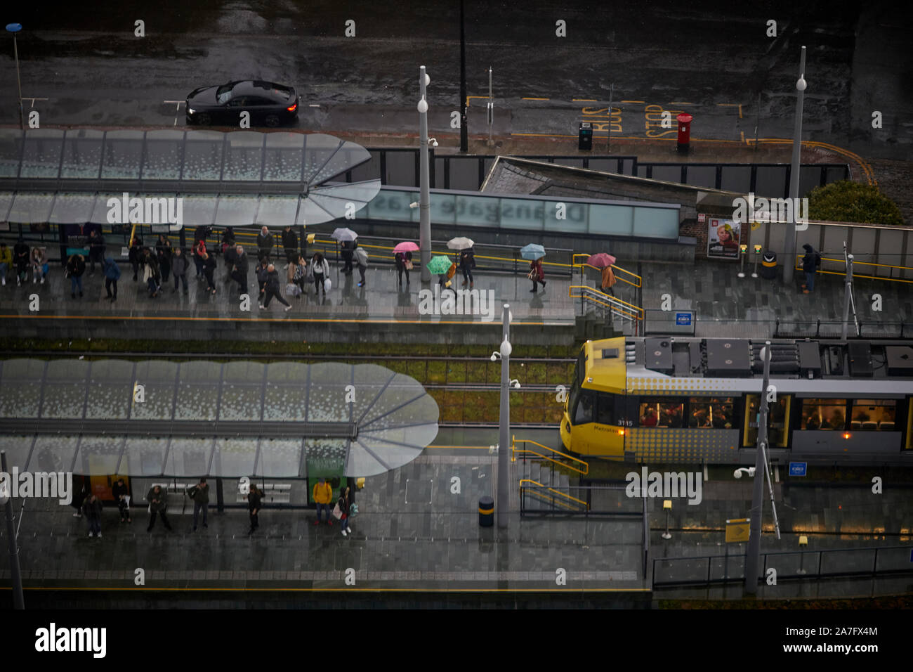 Manchester Deansgate Castlefield Metrolink tram station from above in the rain Stock Photo