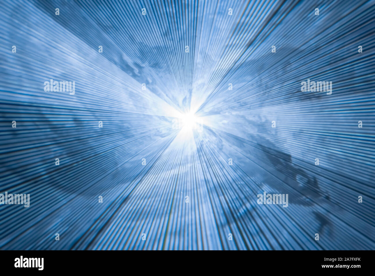 abstract blurred blue background with diverging light rays laser