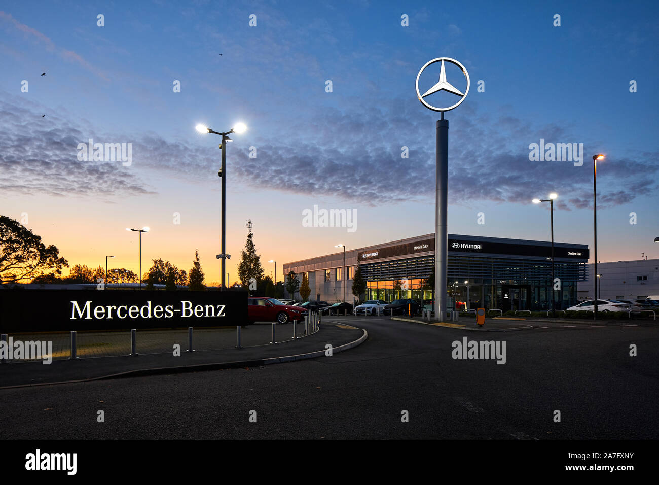 Mercedes Benz car dealership Cheshire Oaks and Hyundai next door Stock