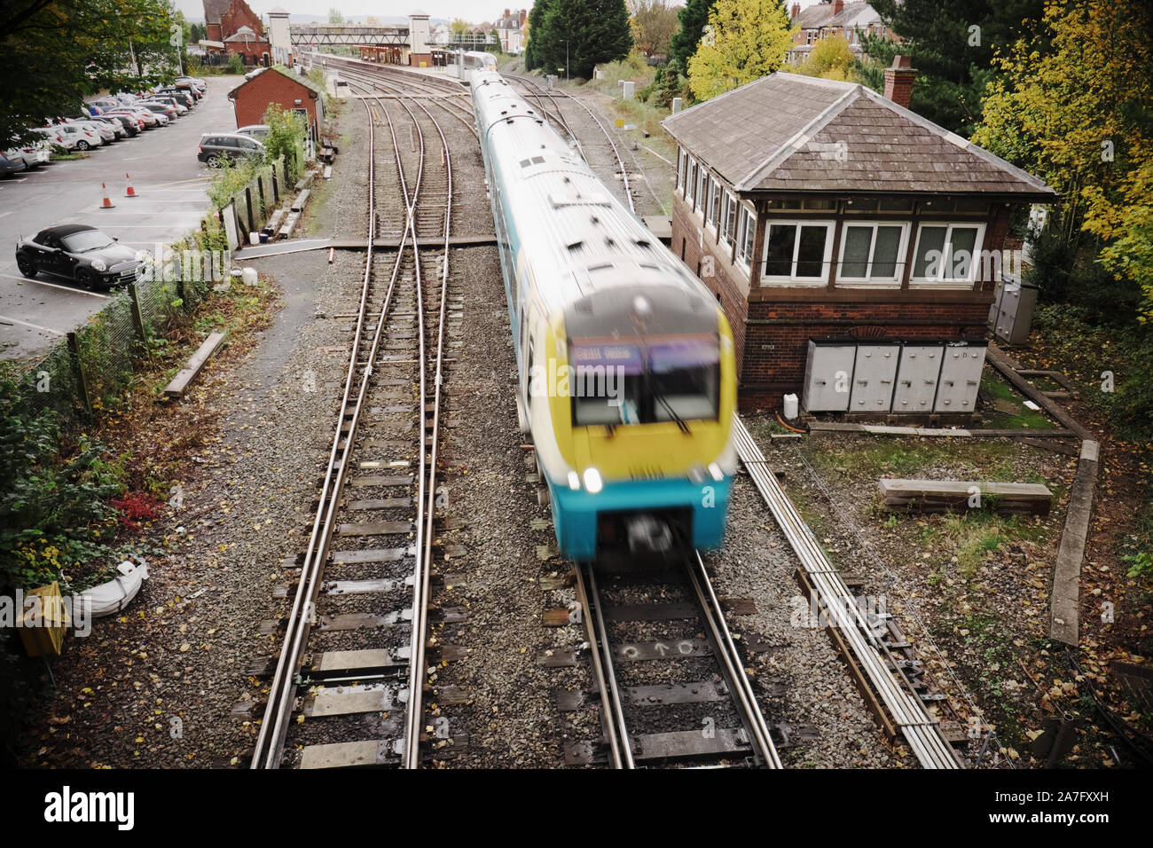 Rail franchise passenger train on Network Rail track system departs Hereford train station November 2019 Stock Photo