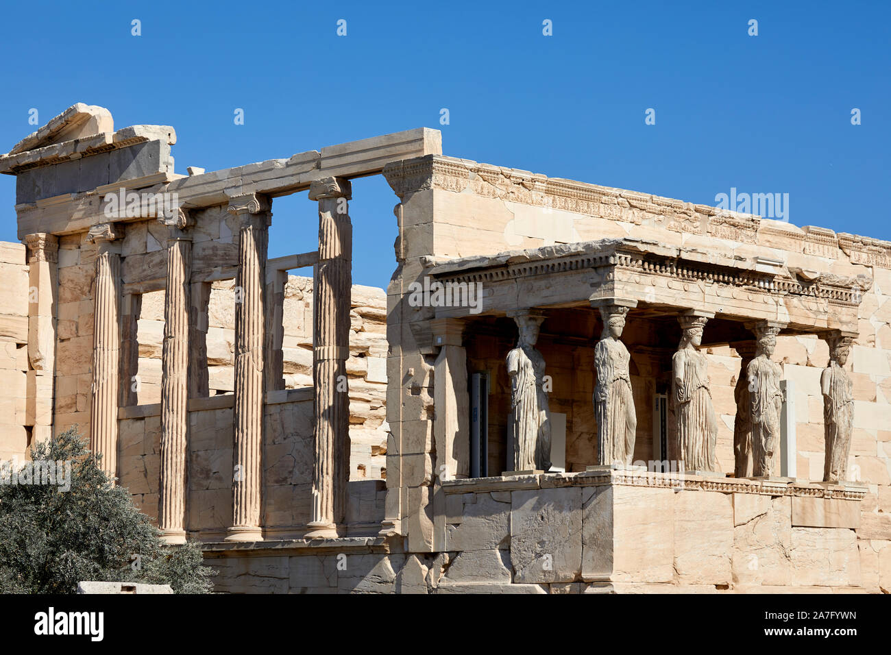 Athens capital of Greece 5th century landmark ruins Parthenon Temple Athens Acropolis, Erechtheion, Porch of the Caryatids,  six Ionic columns, Stock Photo