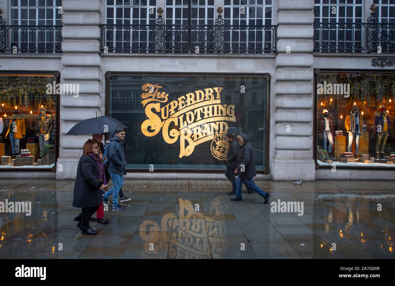 2nd November 2019. Superdry store window with gold lettering reflecting