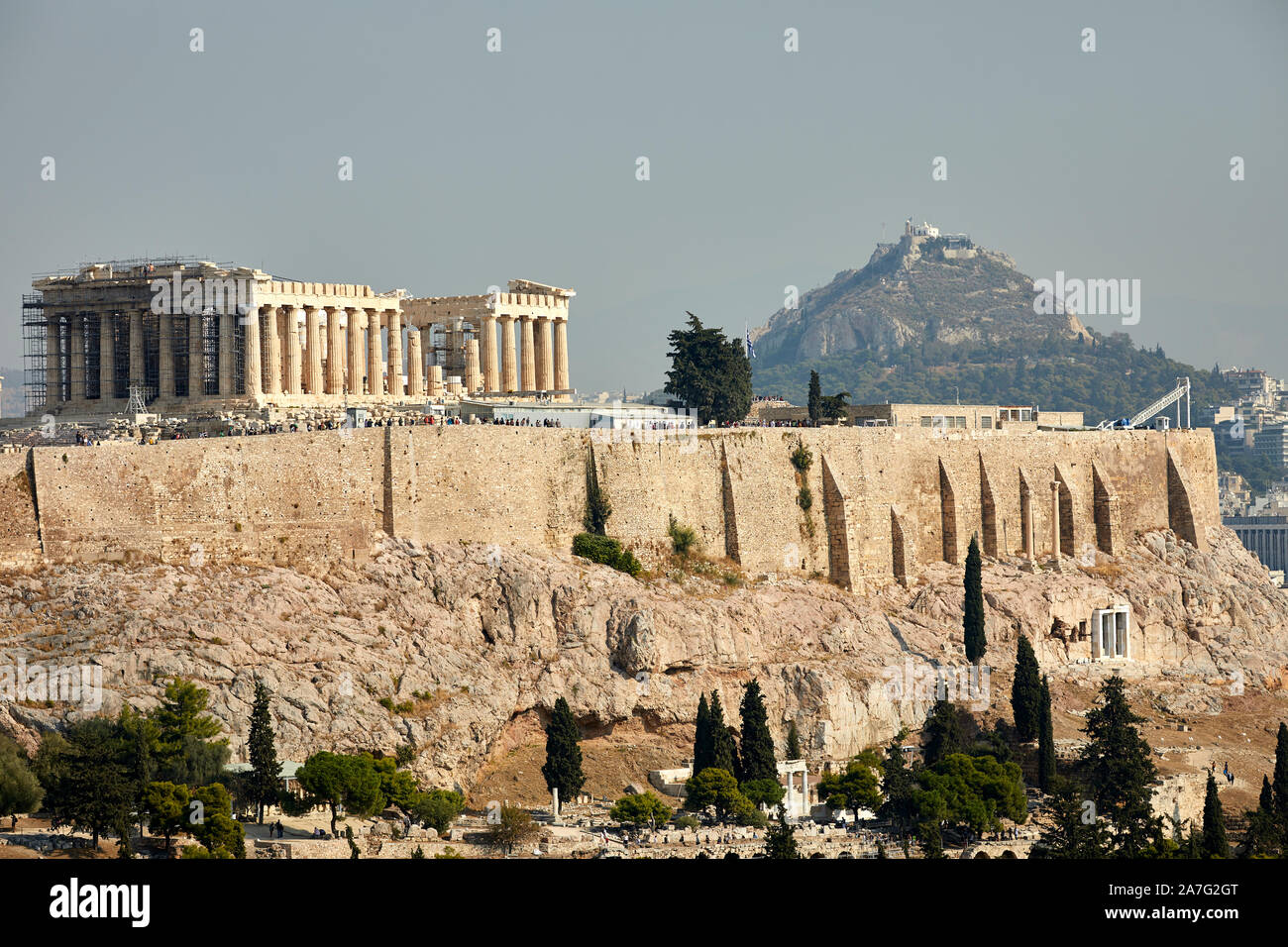 Athens capital of Greece 5th century landmark ruins Parthenon Temple Athens Acropolis, Situated on top of a rocky hill, overlooking the city of Athens Stock Photo