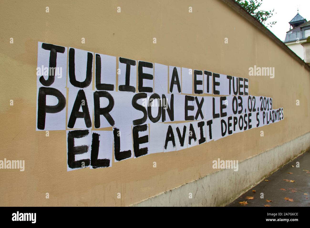 Poster on a Paris street protesting against French femicide and domestic violence Stock Photo