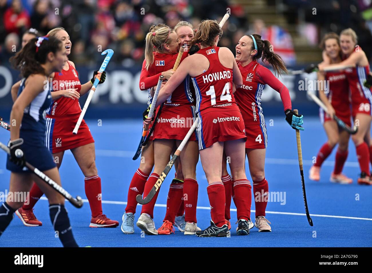 Stratford. United Kingdom. 02 November 2019. Goalscorer Izzy Petter (Great Britain, 33) is congratulated by Hannah Martin (Great Britain) and Tess Howard (Great Britain, 14). Great Britain v Chile. FIH Womens Olympic hockey qualifier. Lee Valley hockey and tennis centre. Stratford. London. United Kingdom. Credit Garry Bowden/Sport in Pictures. Credit: Sport In Pictures/Alamy Live News Stock Photo
