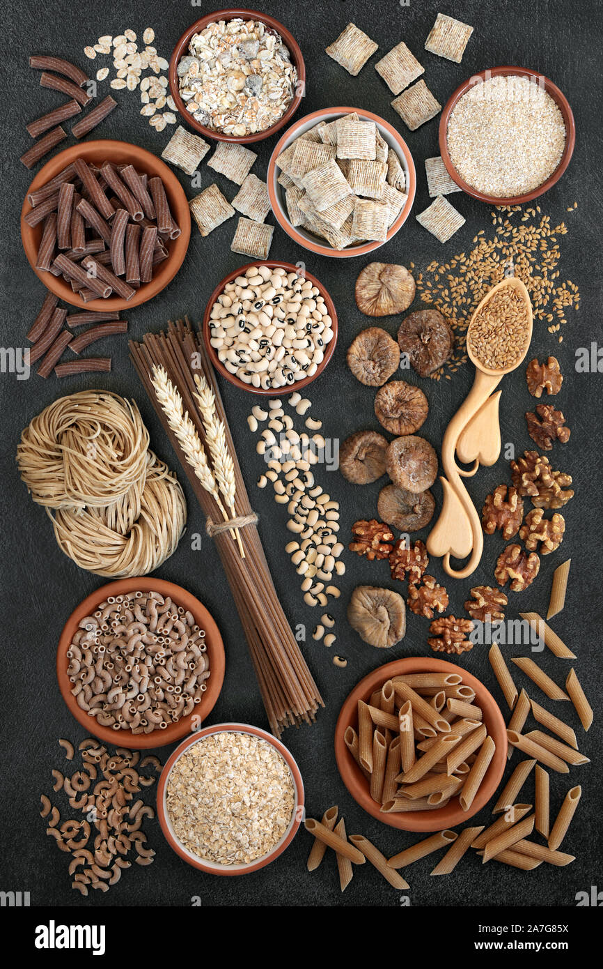 High fibre health food concept with legumes, cereals, pasta, grains