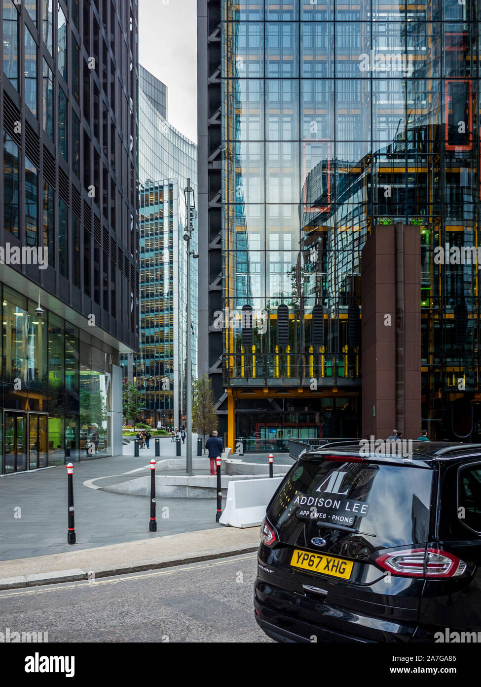 Addison Lee Taxi waiting for passengers in the City of London. The company runs a fleet of 4000 vehicles, mainly in London. Addison Lee Courier. Stock Photo