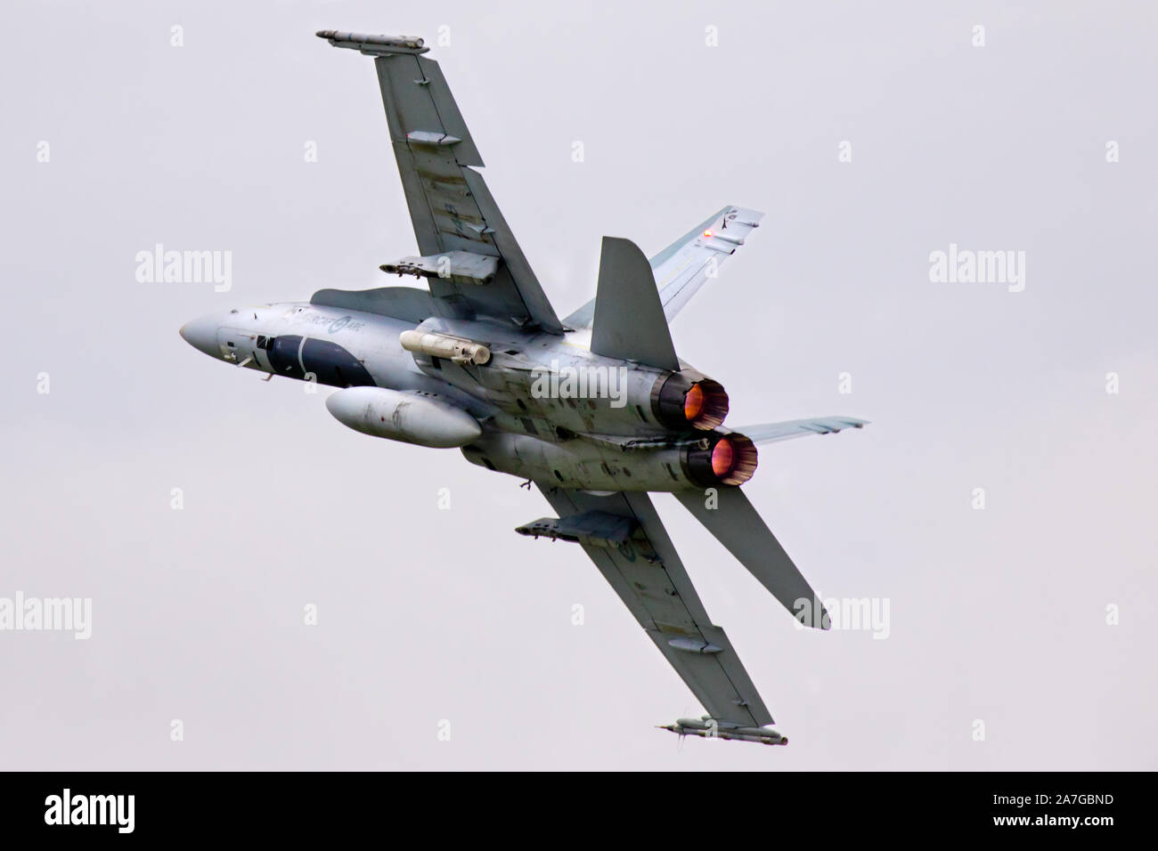 A McDonnell Douglas CF-18 Hornet, during a flyby, as it powers up and away from the spectators at Airshow London, in London, Ontario, Canada. Stock Photo