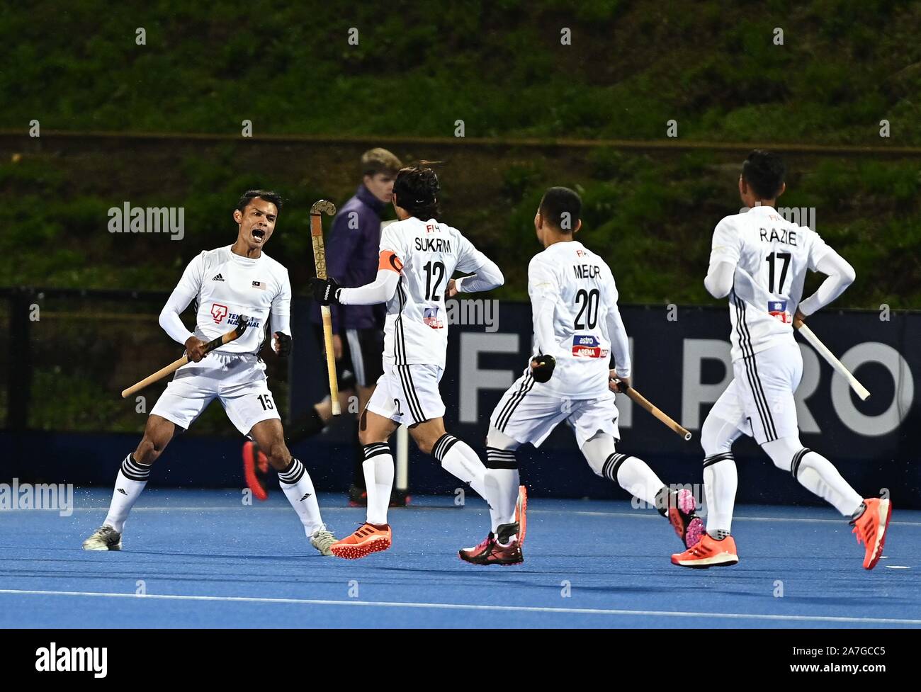 Stratford, United Kingdom. 02nd Nov, 2019. Goalscorer Nabil Noor (Malaysia, left) celebrates scoring the first goal. Great Britain v Malaysia. FIH Mens Olympic hockey qualifier. Lee Valley hockey and tennis centre. Stratford. London. United Kingdom. Credit Garry Bowden/Sport in Pictures/Alamy Live News. Credit: Sport In Pictures/Alamy Live News Stock Photo