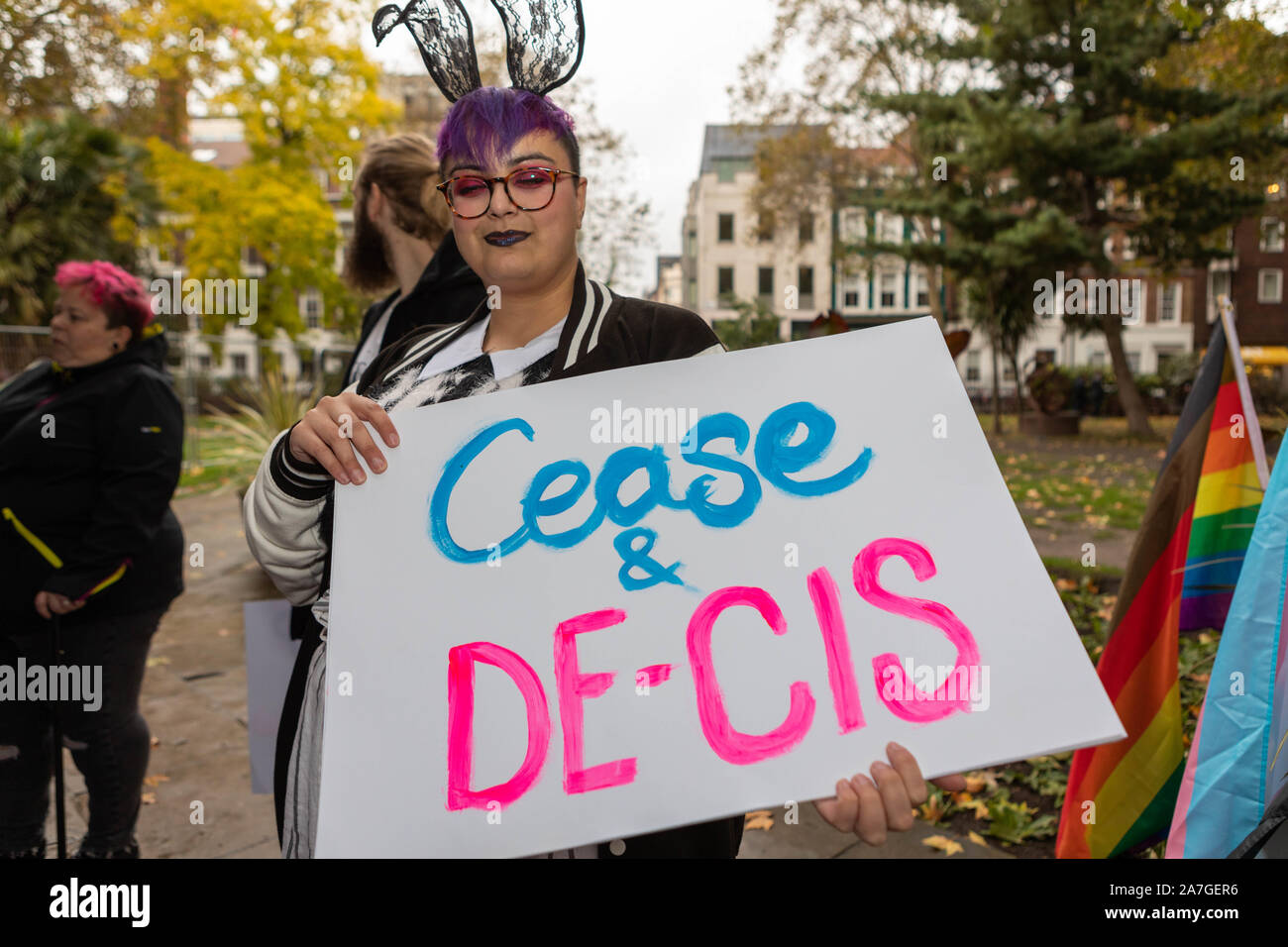 London, UK. 2nd Nov, 2019. A protester with purple hair and glasses ...