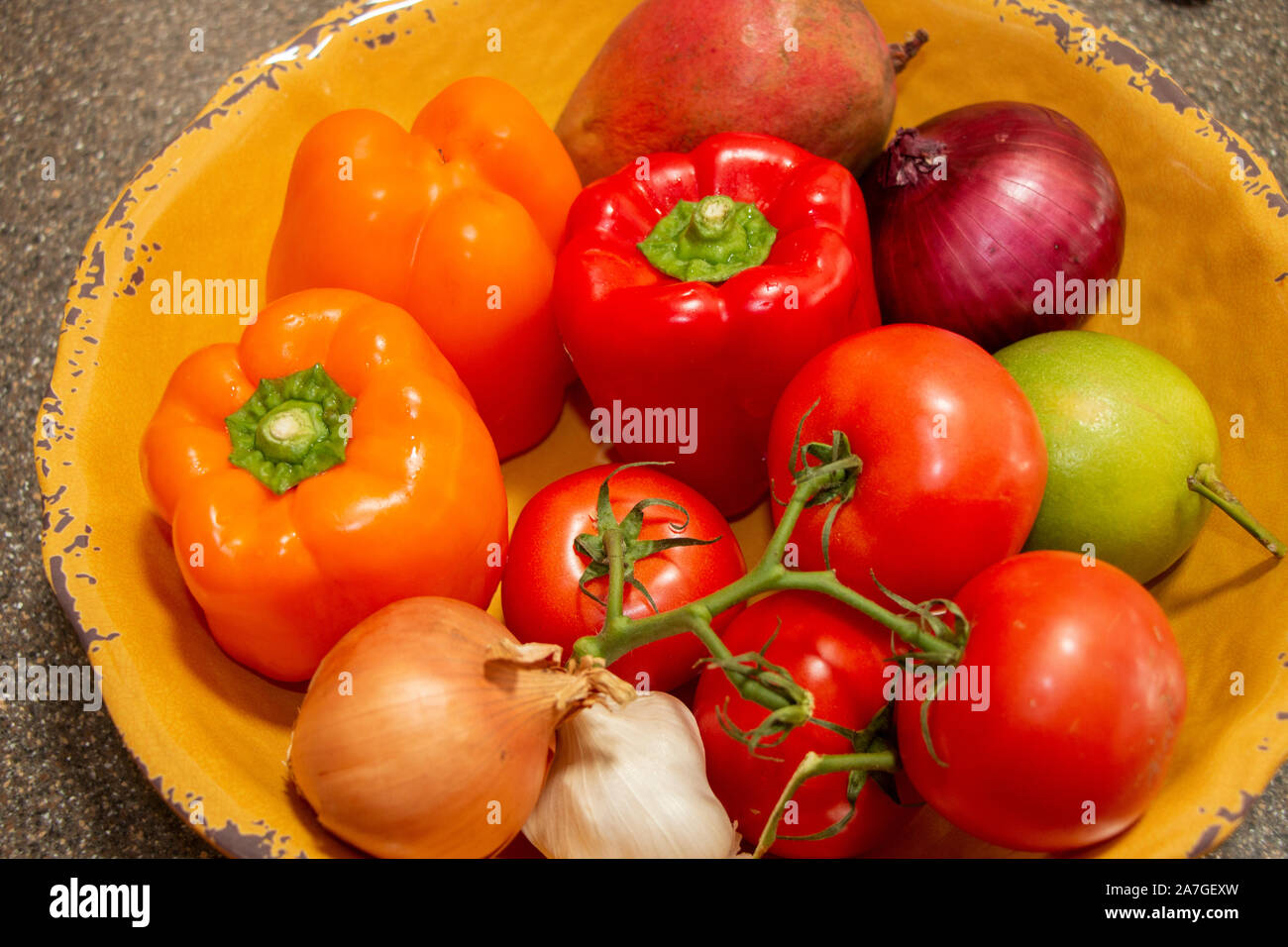 A Bowl of Fresh Whole Organic Veggies for Making Organic Salsa Stock Photo