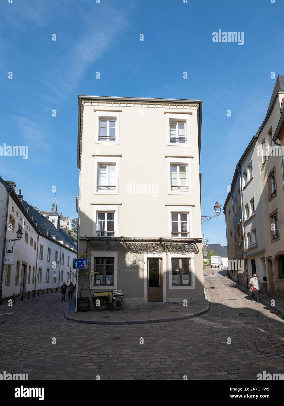 people and narrow streets in grund or old town of luxembourg city Stock Photo